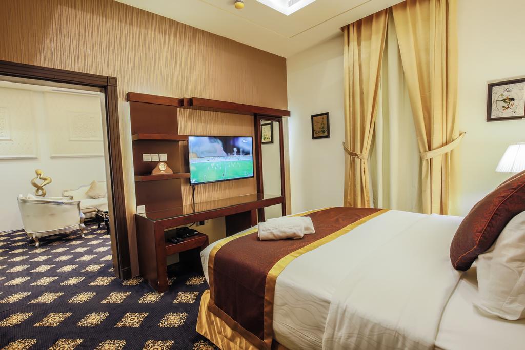 Rest Night Serviced Apartments- Alhamra Riad Exterior foto A bedroom in the hotel